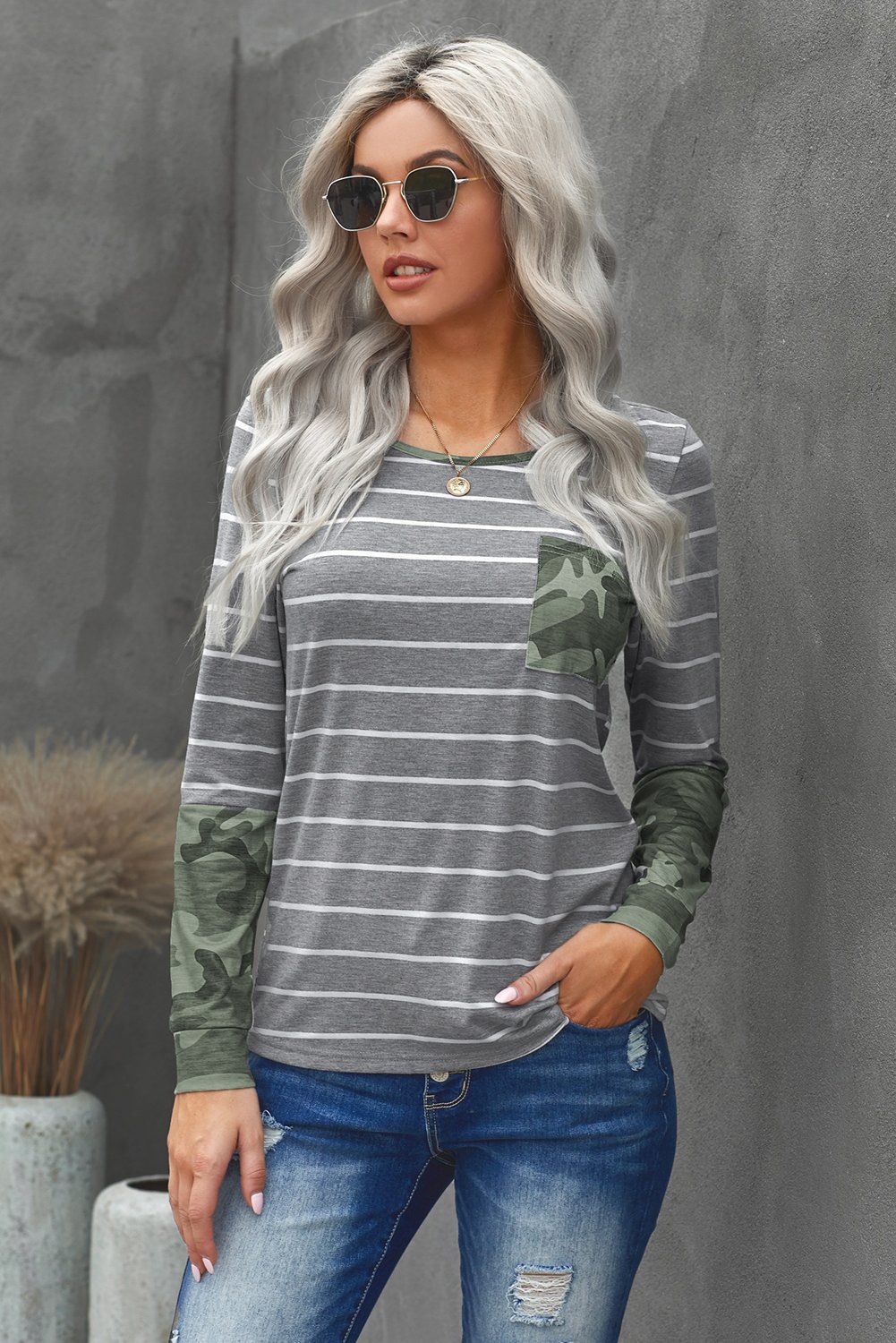 Camo Stripes Long Sleeves Top featuring a stylish camo print on cuffs and pocket, designed to flatter curves with a chic striped design.