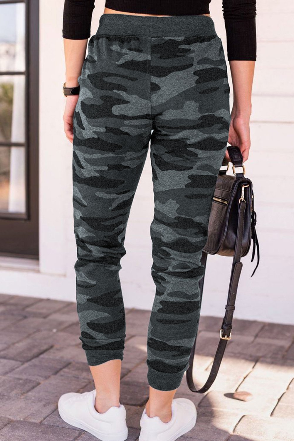 A pair of stylish camouflage drawstring joggers featuring an elastic waistband and side pockets, perfect for workouts and casual wear.