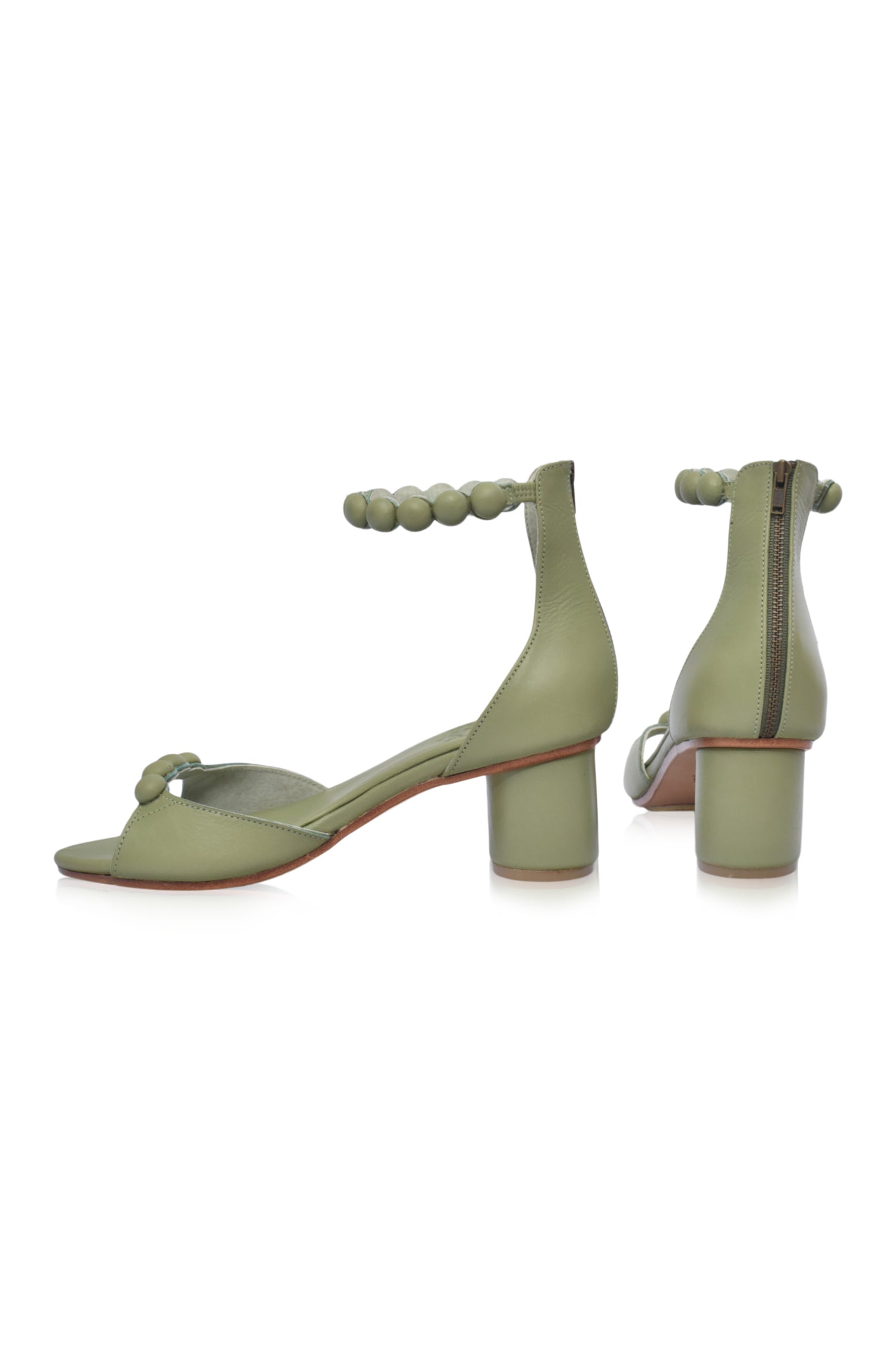 Candy Round Heel Sandals featuring leather-covered buttons and a lightweight wooden heel, perfect for summer outfits.