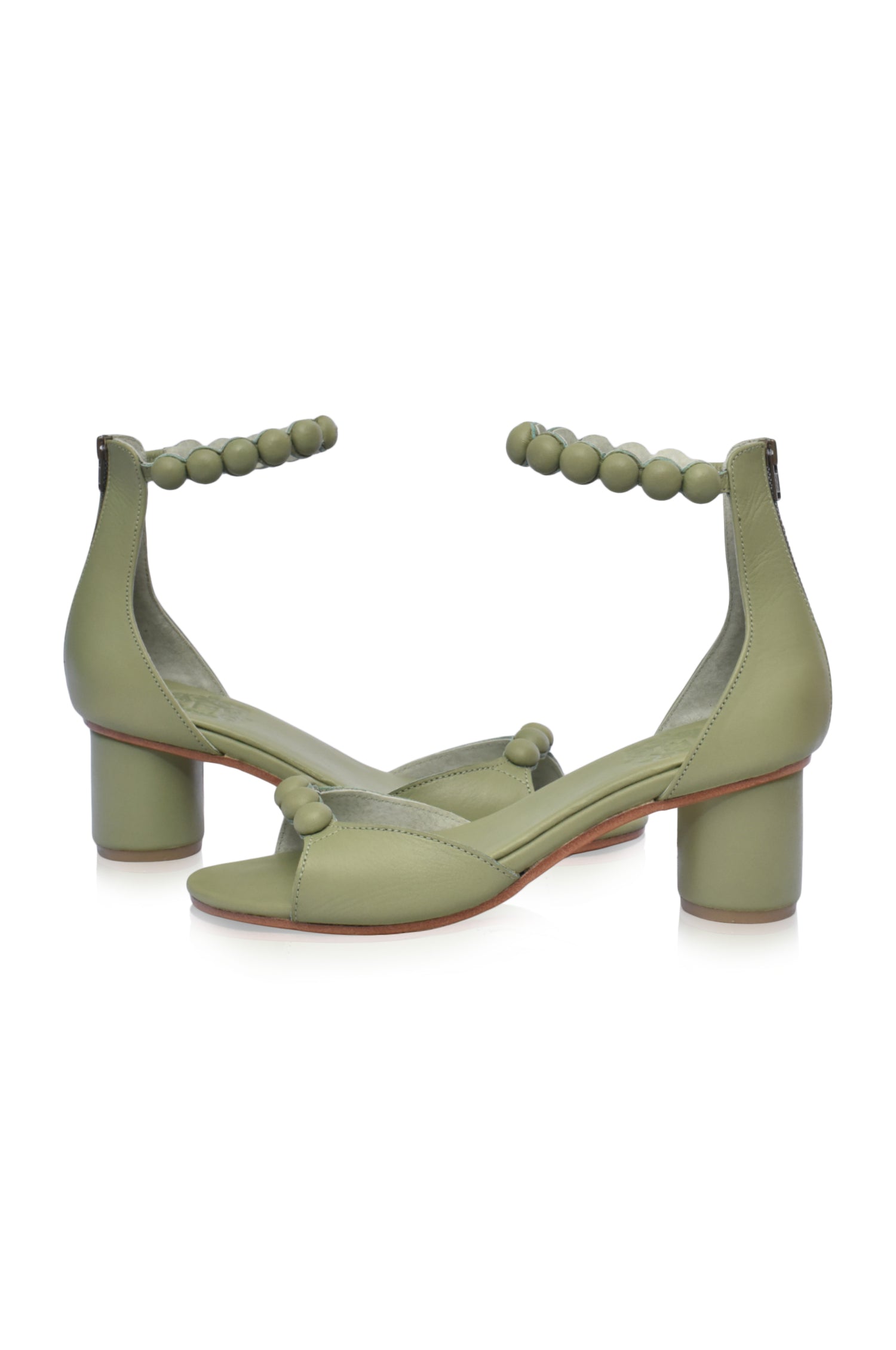 Candy Round Heel Sandals featuring leather-covered buttons and a lightweight wooden heel, perfect for summer outfits.