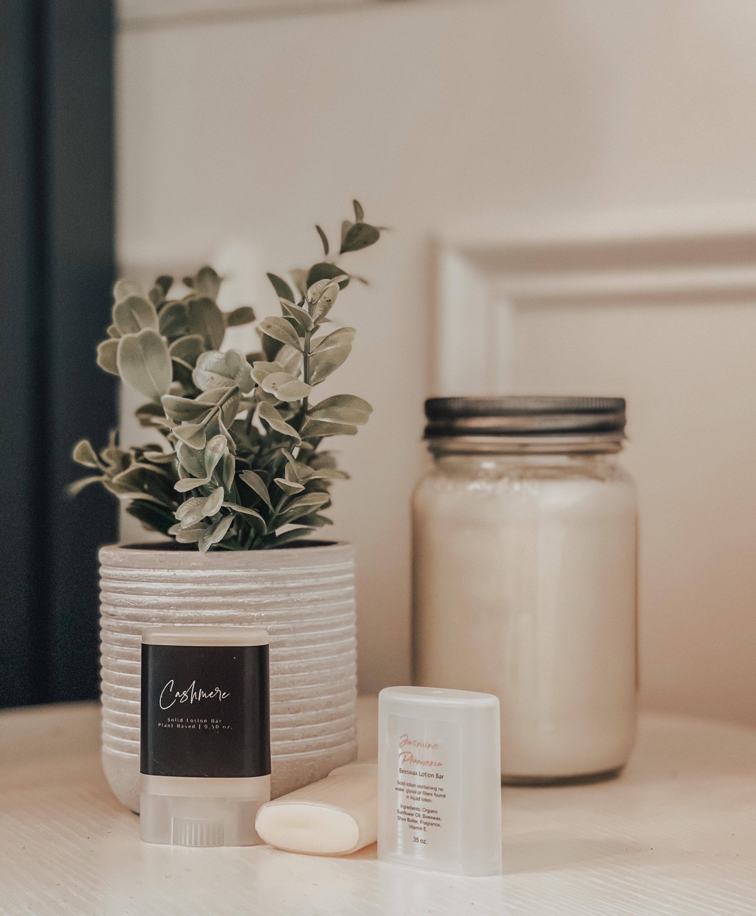 Cashmere Lotion & Scent Bar in a roll-up format, showcasing various scents and a solid lotion design for easy application.