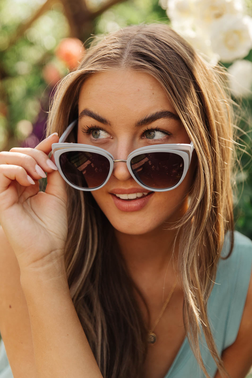 A pair of stylish Cat Eye Sunglasses in blue, showcasing a modern retro design with UV protection.