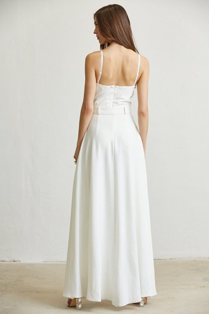 Channary Gold Button Front Detail Jumpsuit featuring a solid stretch bodice, pleated chiffon wide-leg pants, and elegant gold button accents.