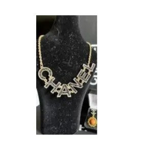 Charming Women Necklace featuring a luxurious gold CC pendant, elegantly designed for women.