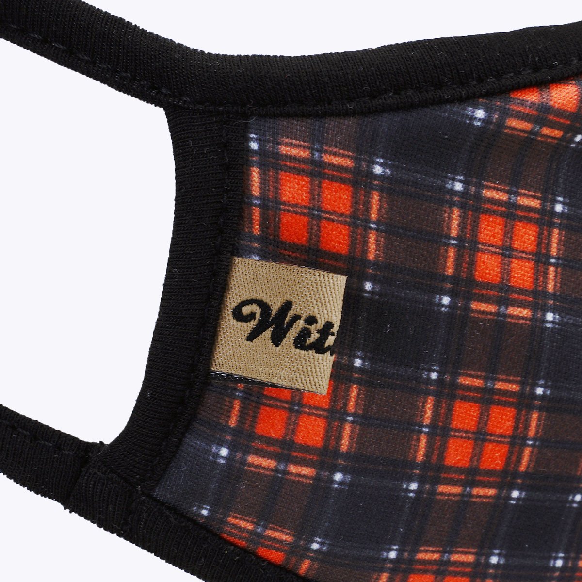 Plaid-patterned fabric face mask.