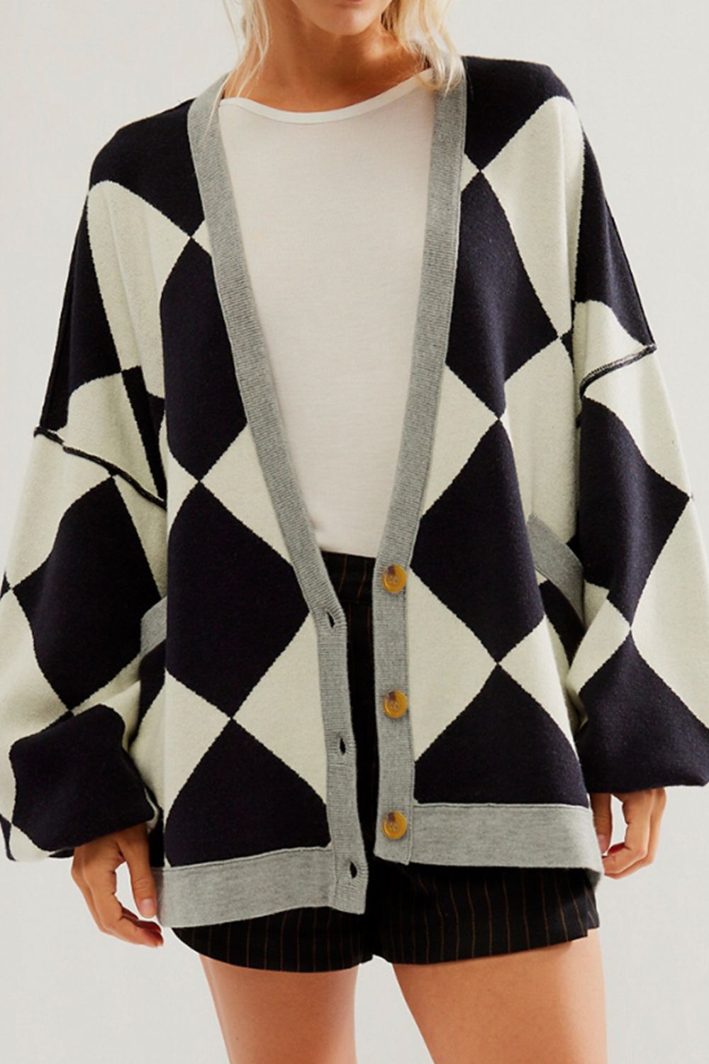 Checkered Button Up Long Sleeve Cardigan with pockets, showcasing a stylish design and comfortable fit.