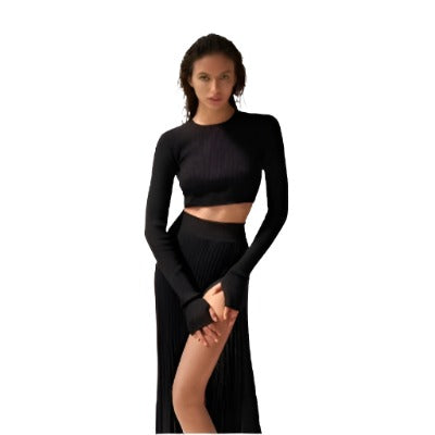 Chic Pullover and Knitted Pleated Skirt Suit featuring a high slit and long sleeves, perfect for stylish women.