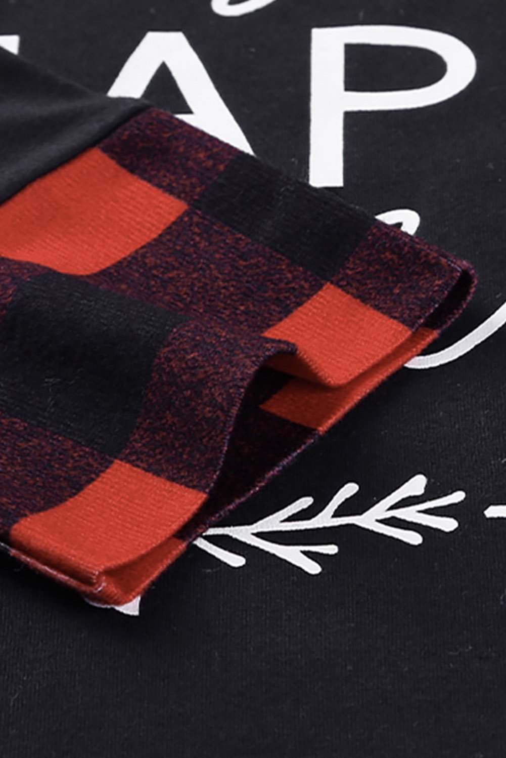 A stylish long sleeve top featuring Christmas letter prints with red plaid cuffs and hem, perfect for festive occasions.