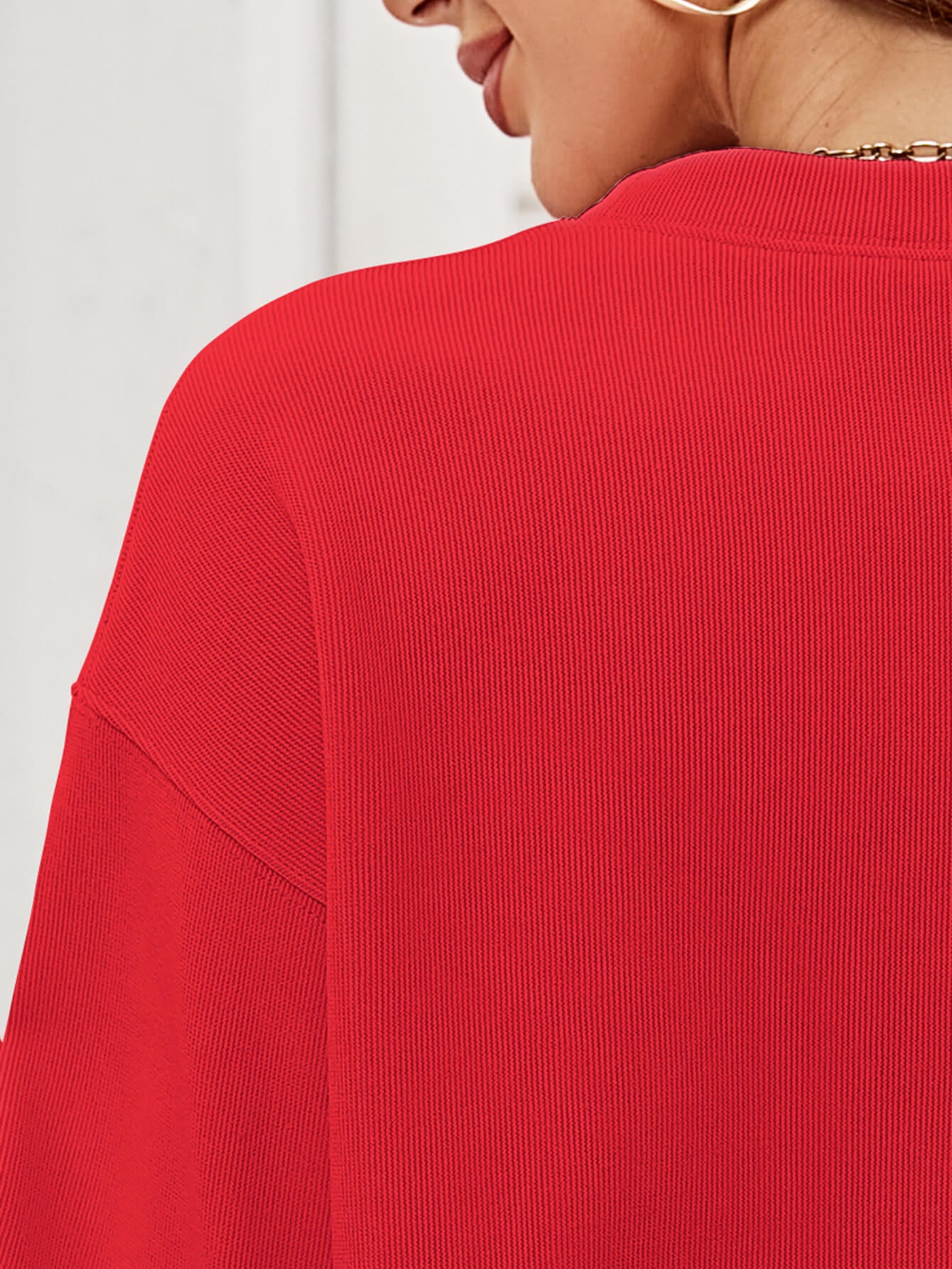 A cozy Christmas Plaid Graphic Dropped Shoulder Sweatshirt featuring a festive plaid design, long sleeves, and a relaxed fit.