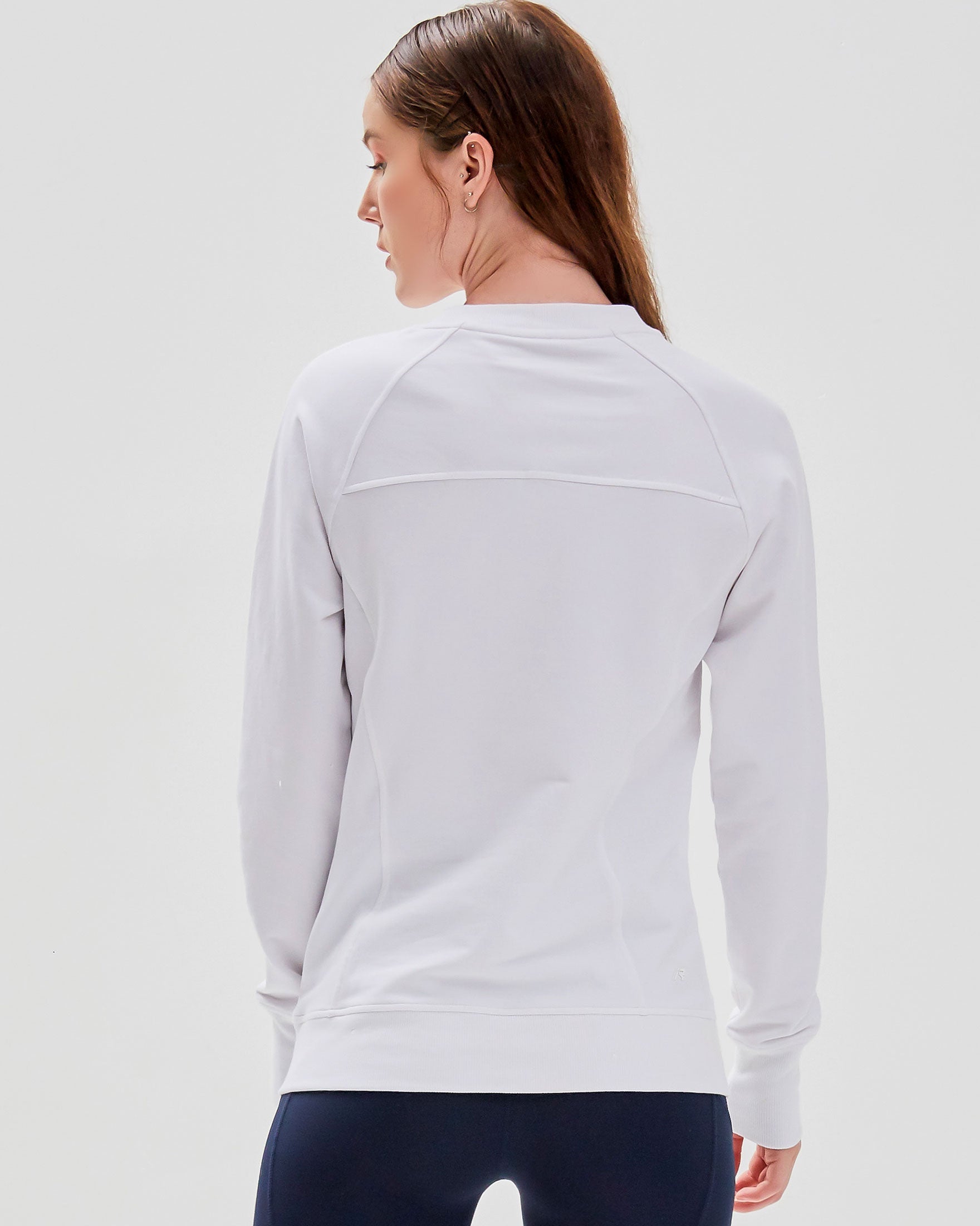 City Zip Slim Crewneck sweatshirt in modern fitted style, featuring ribbed cuffs and hidden zipper seams, perfect for active lifestyles.