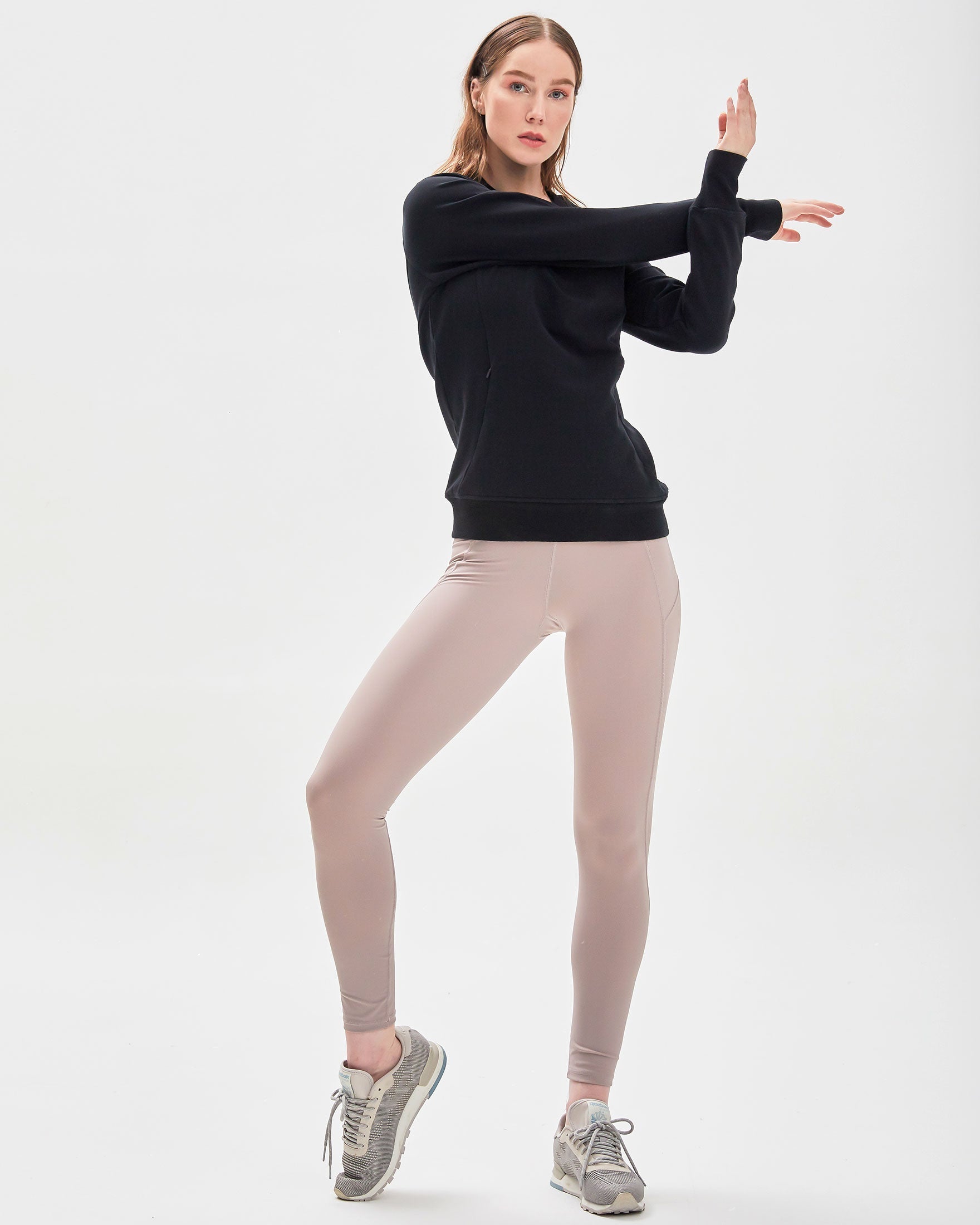 City Zip Slim Crewneck sweatshirt in modern fitted style, featuring ribbed cuffs and hidden zipper seams, perfect for active lifestyles.