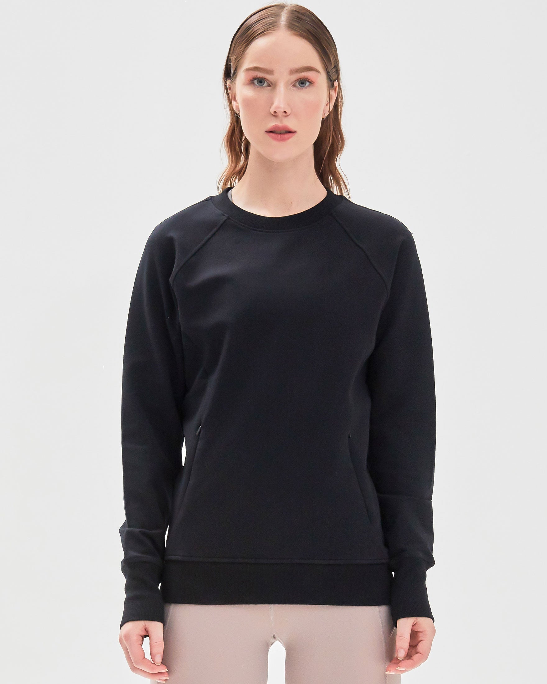 City Zip Slim Crewneck sweatshirt in modern fitted style, featuring ribbed cuffs and hidden zipper seams, perfect for active lifestyles.