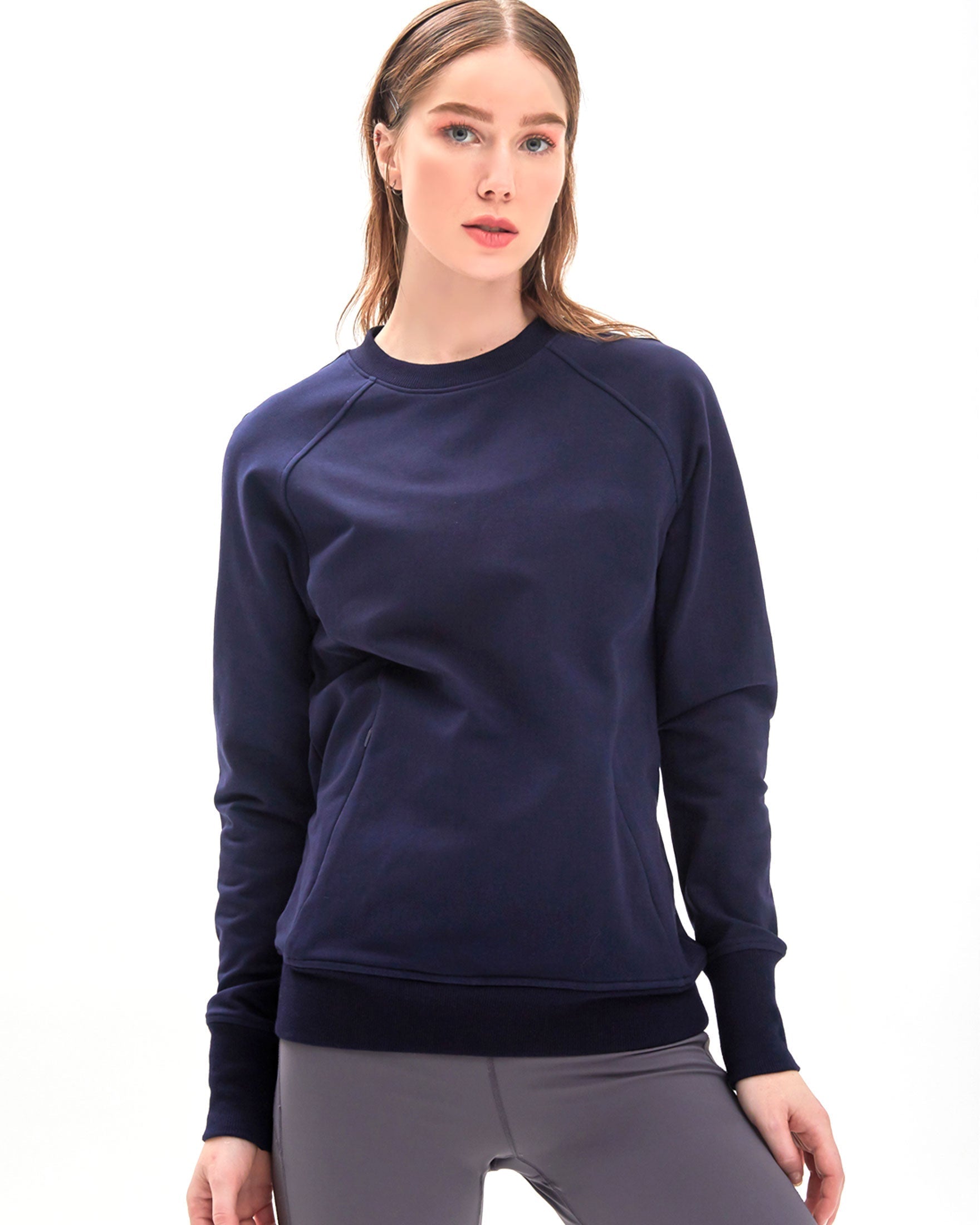 City Zip Slim Crewneck sweatshirt in modern fitted style, featuring ribbed cuffs and hidden zipper seams, perfect for active lifestyles.