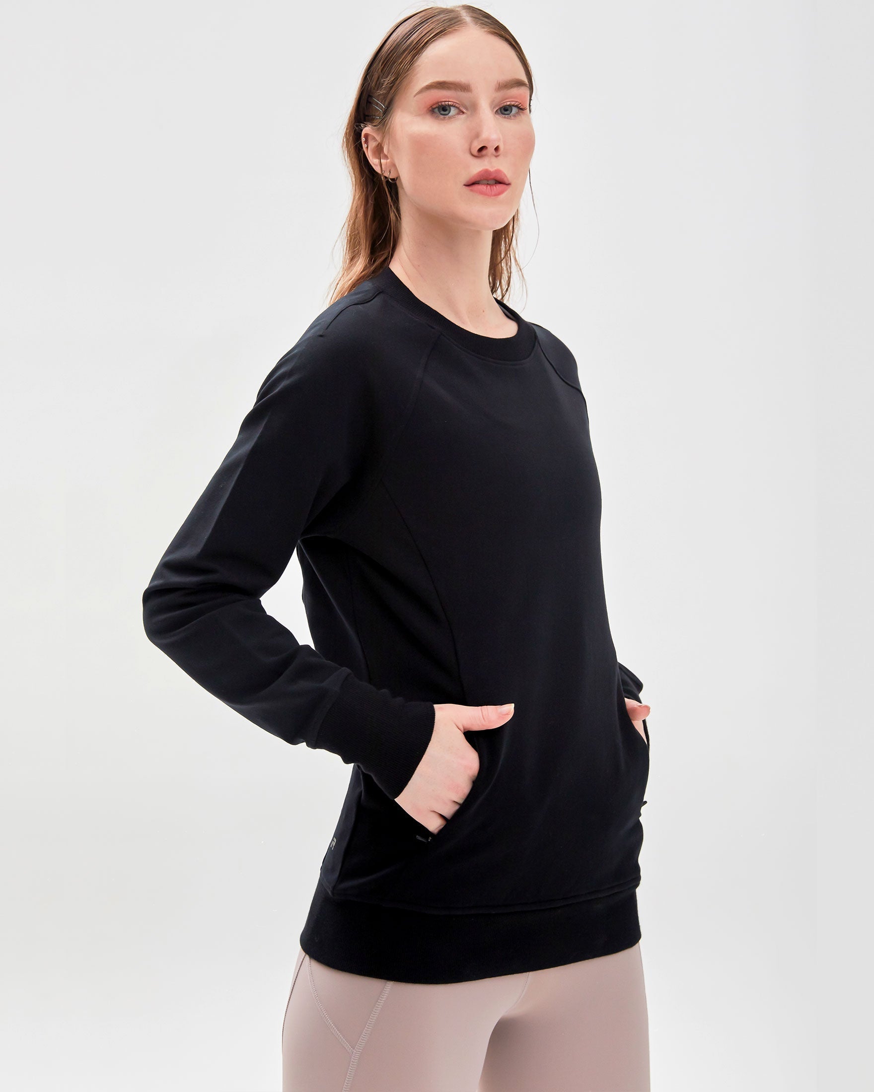 City Zip Slim Crewneck sweatshirt in modern fitted style, featuring ribbed cuffs and hidden zipper seams, perfect for active lifestyles.