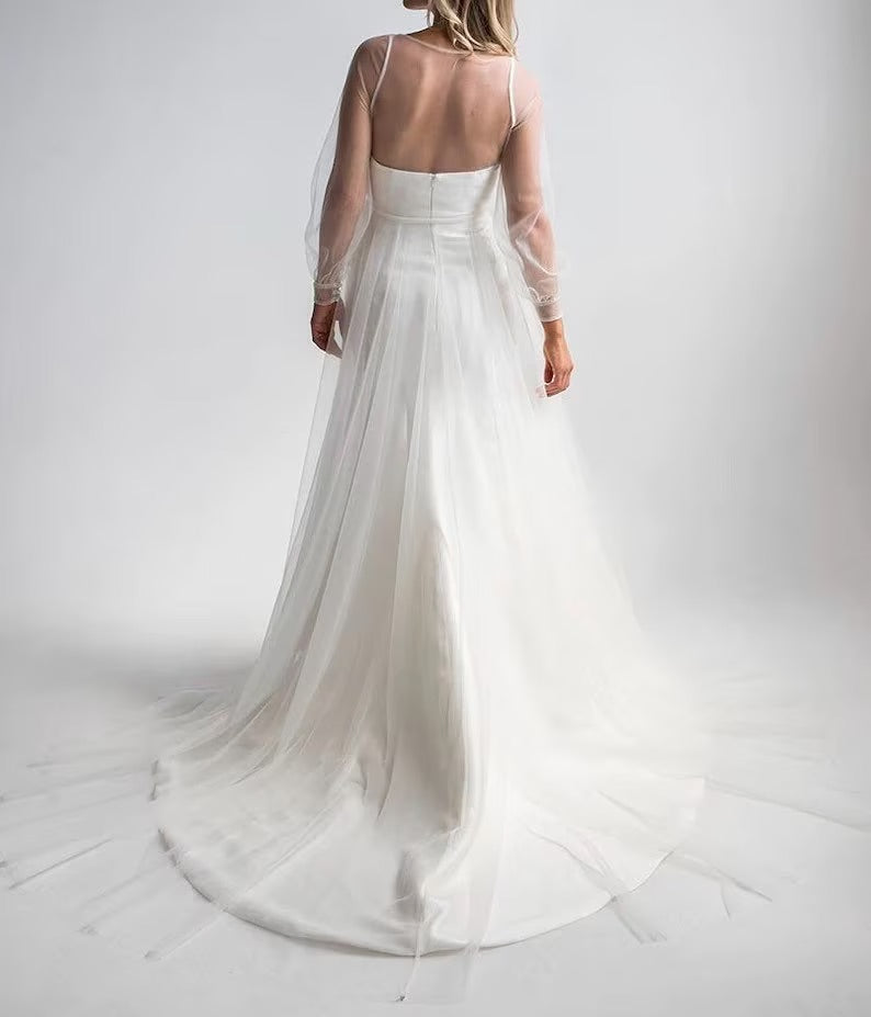 Clair De Lune Overlay dress featuring a layered design in elegant fabric, perfect for special occasions.