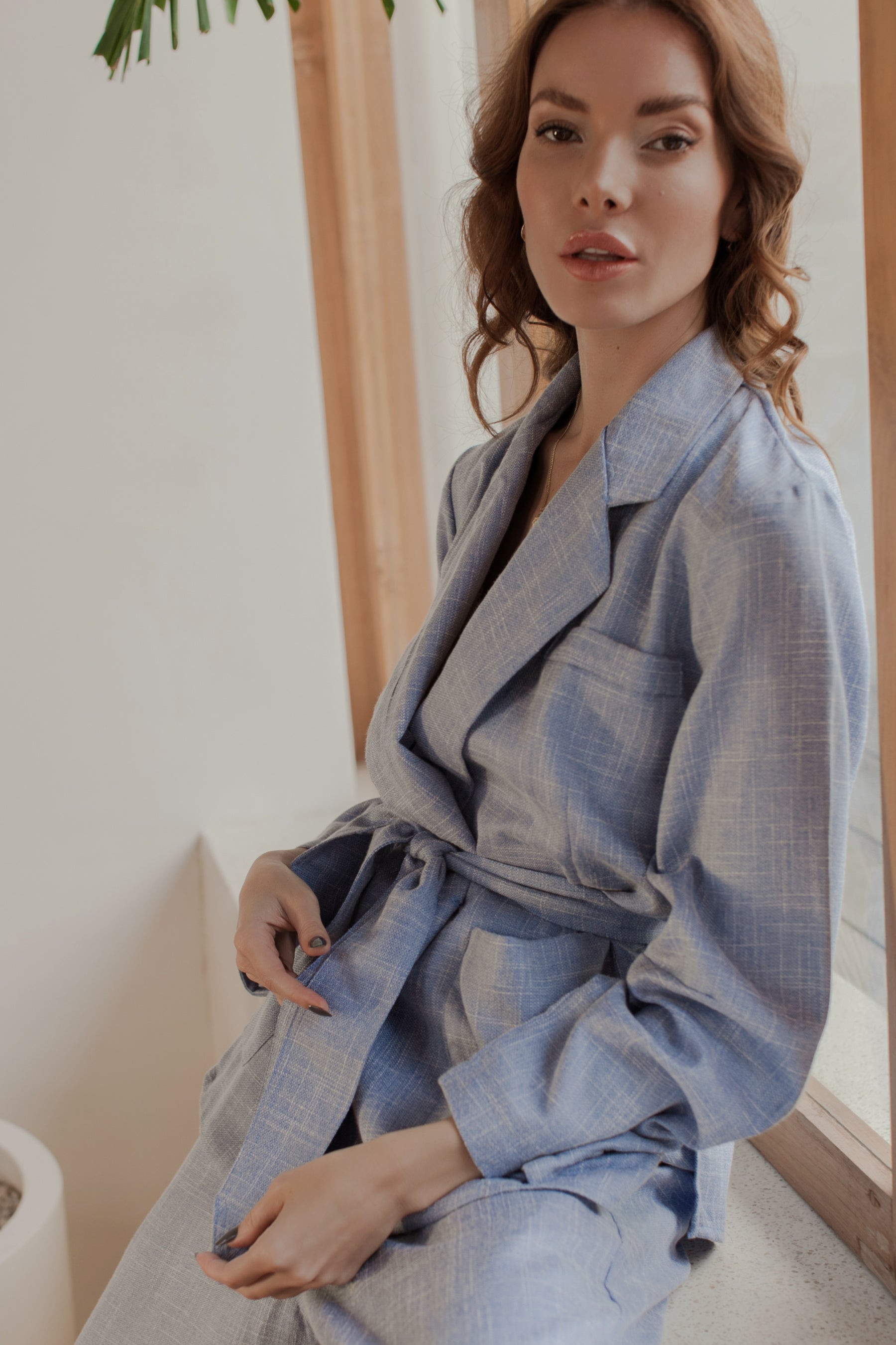 Coco Cotton Belted Blazer in Latte and Skyline colors, showcasing structured shoulders and matching tie belt.