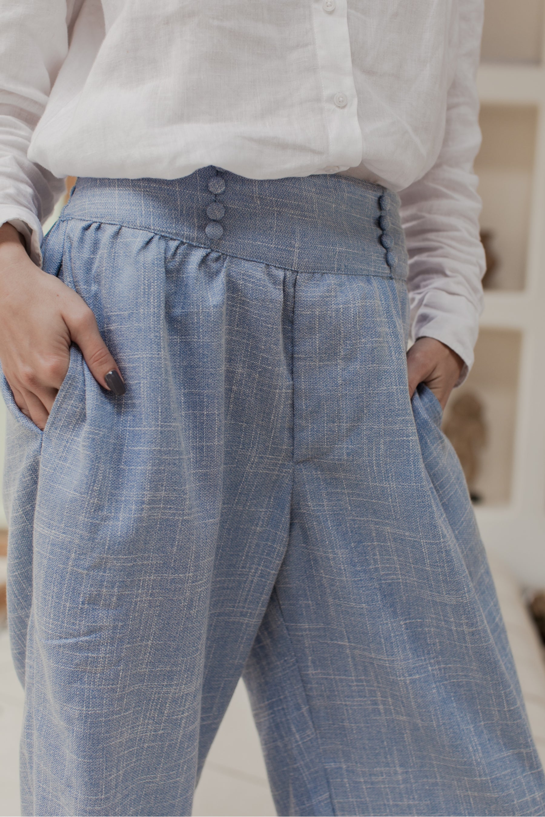 Coco Cotton Wide-Leg Pants in Latte and Skyline colors, showcasing organic cotton fabric and elasticated waist design.