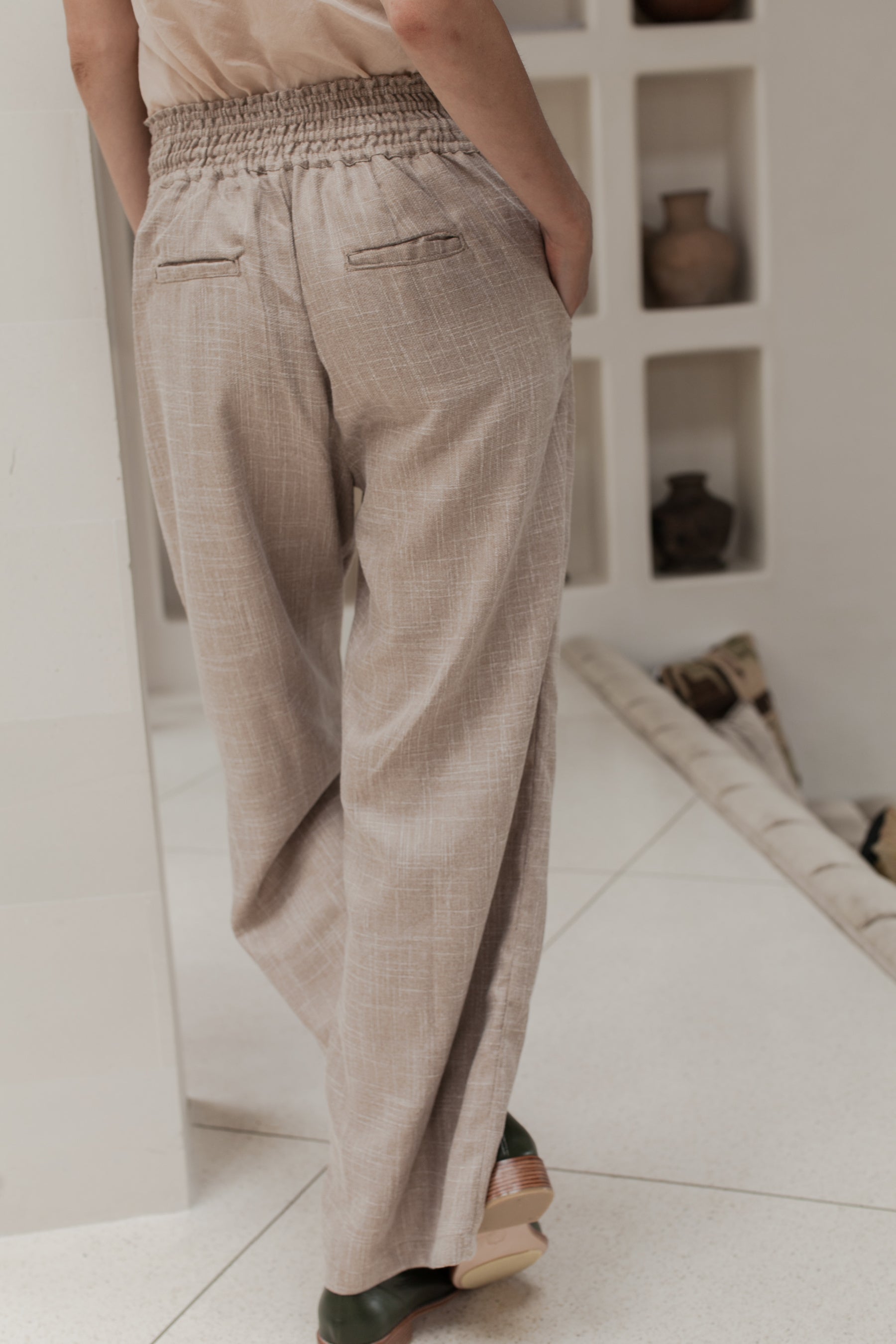 Coco Cotton Wide-Leg Pants in Latte and Skyline colors, showcasing organic cotton fabric and elasticated waist design.