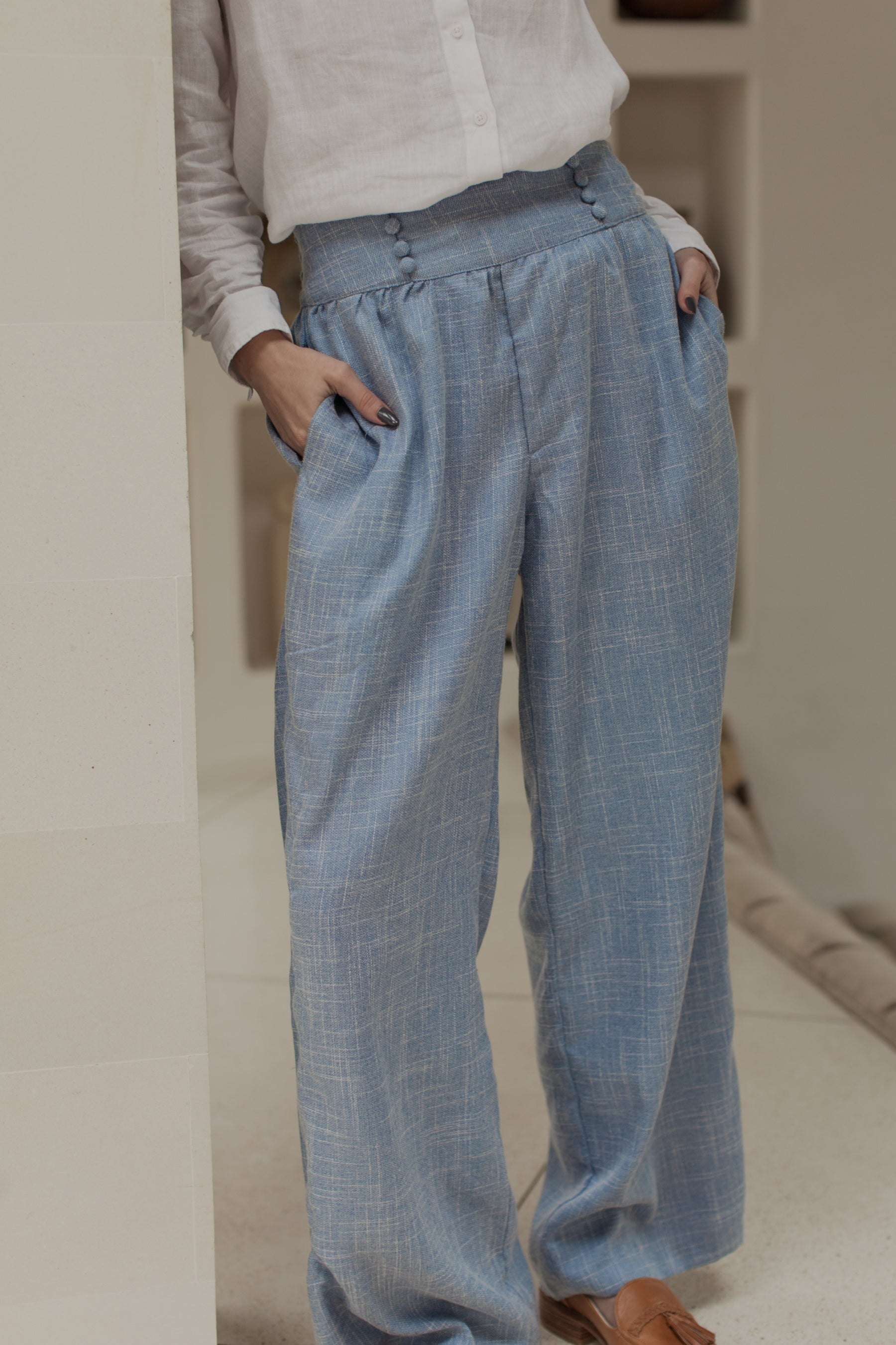 Coco Cotton Wide-Leg Pants in Latte and Skyline colors, showcasing organic cotton fabric and elasticated waist design.
