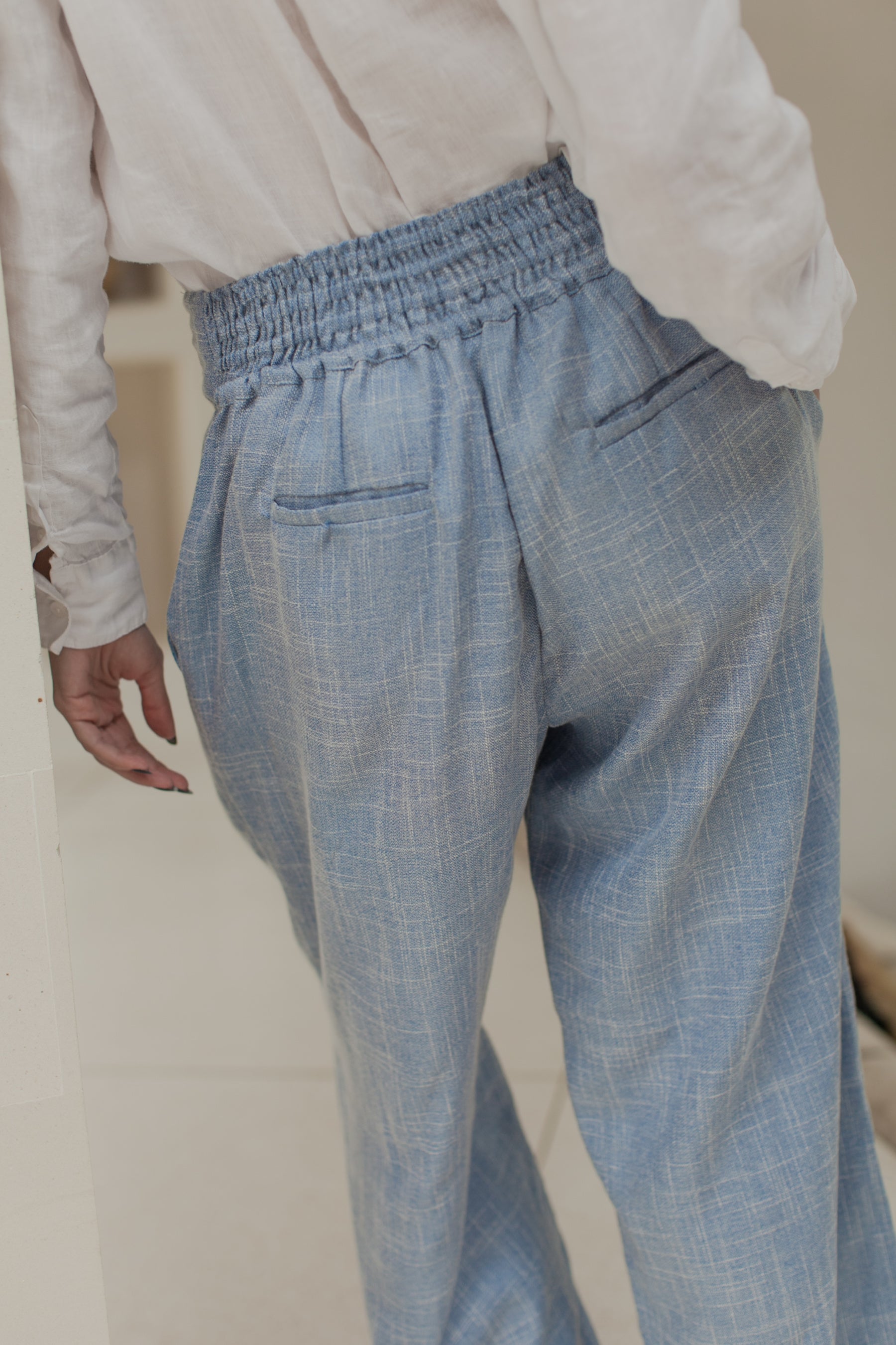 Coco Cotton Wide-Leg Pants in Latte and Skyline colors, showcasing organic cotton fabric and elasticated waist design.