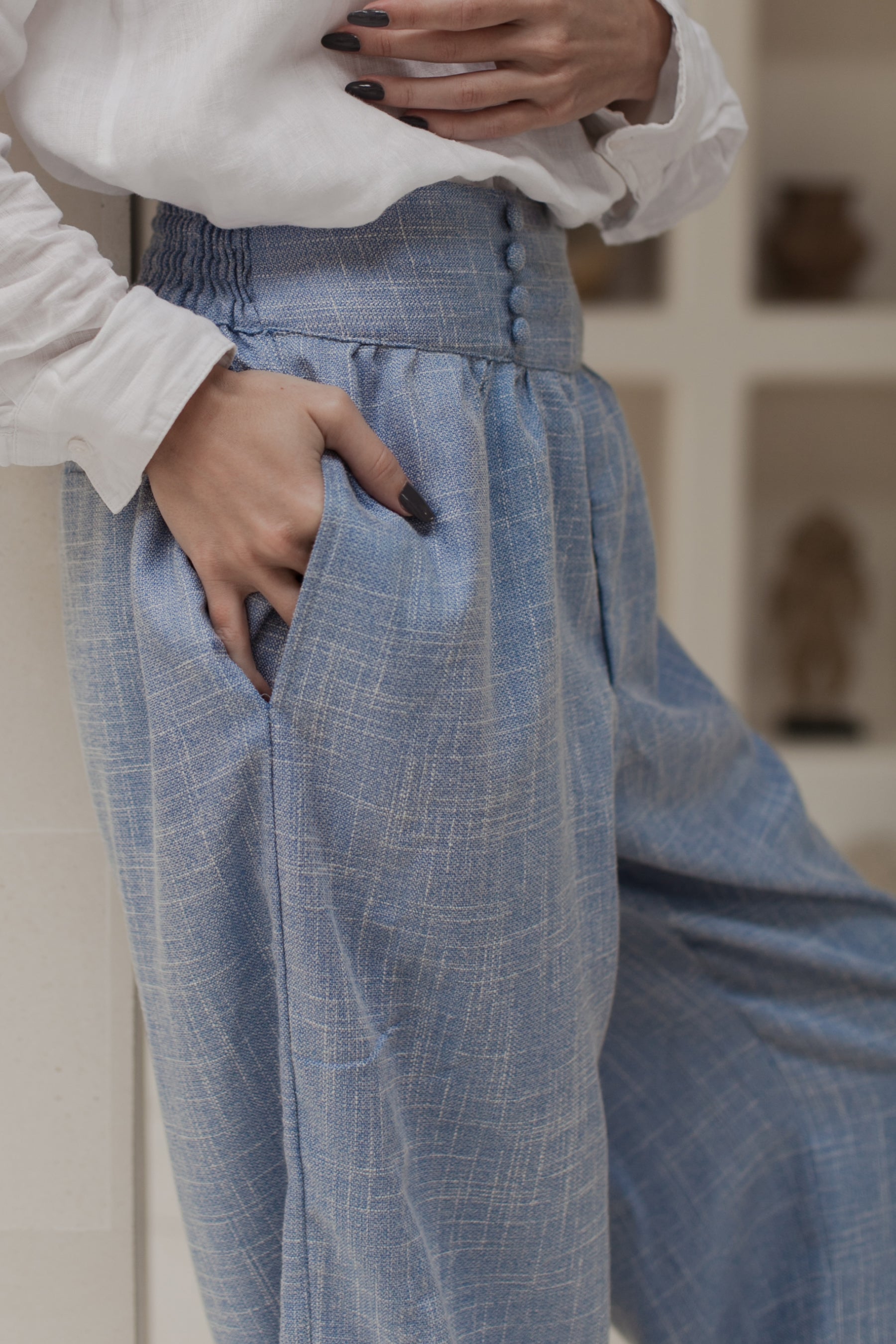 Coco Cotton Wide-Leg Pants in Latte and Skyline colors, showcasing organic cotton fabric and elasticated waist design.