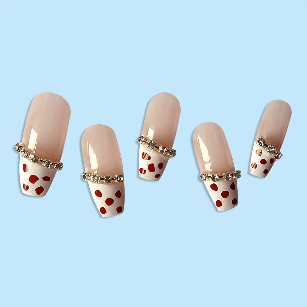 Coffin long fake nails with glitter and rhinestones, featuring a shimmery polka dot design, perfect for stylish manicures.