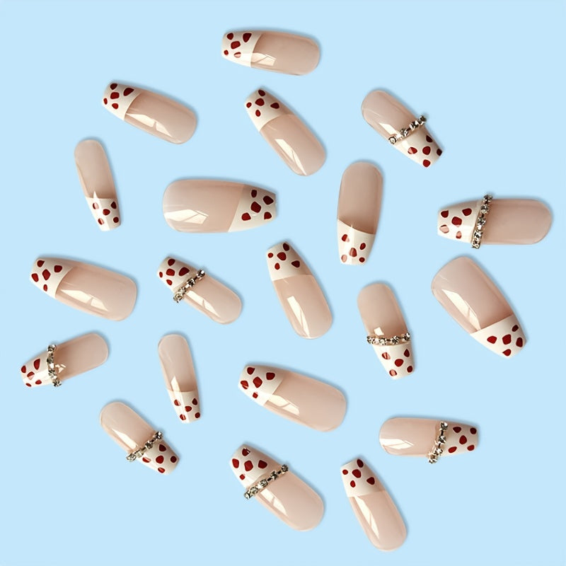 Coffin long fake nails with glitter and rhinestones, featuring a shimmery polka dot design, perfect for stylish manicures.
