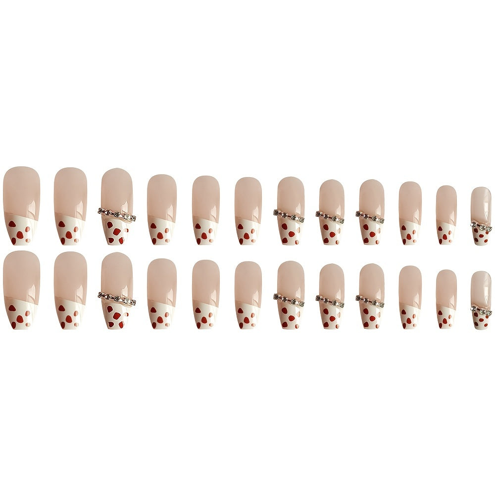 Coffin long fake nails with glitter and rhinestones, featuring a shimmery polka dot design, perfect for stylish manicures.