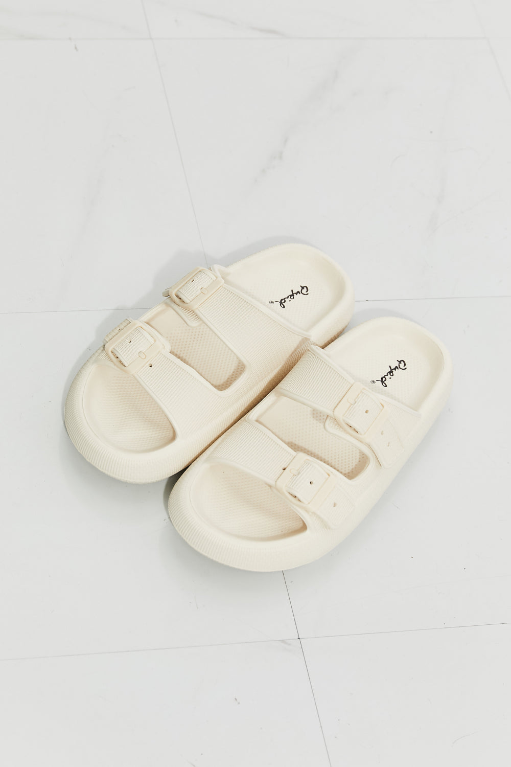 Comfy Casual Rubber Slide Sandal in Cream with adjustable straps and trendy platform design, perfect for summer wear.