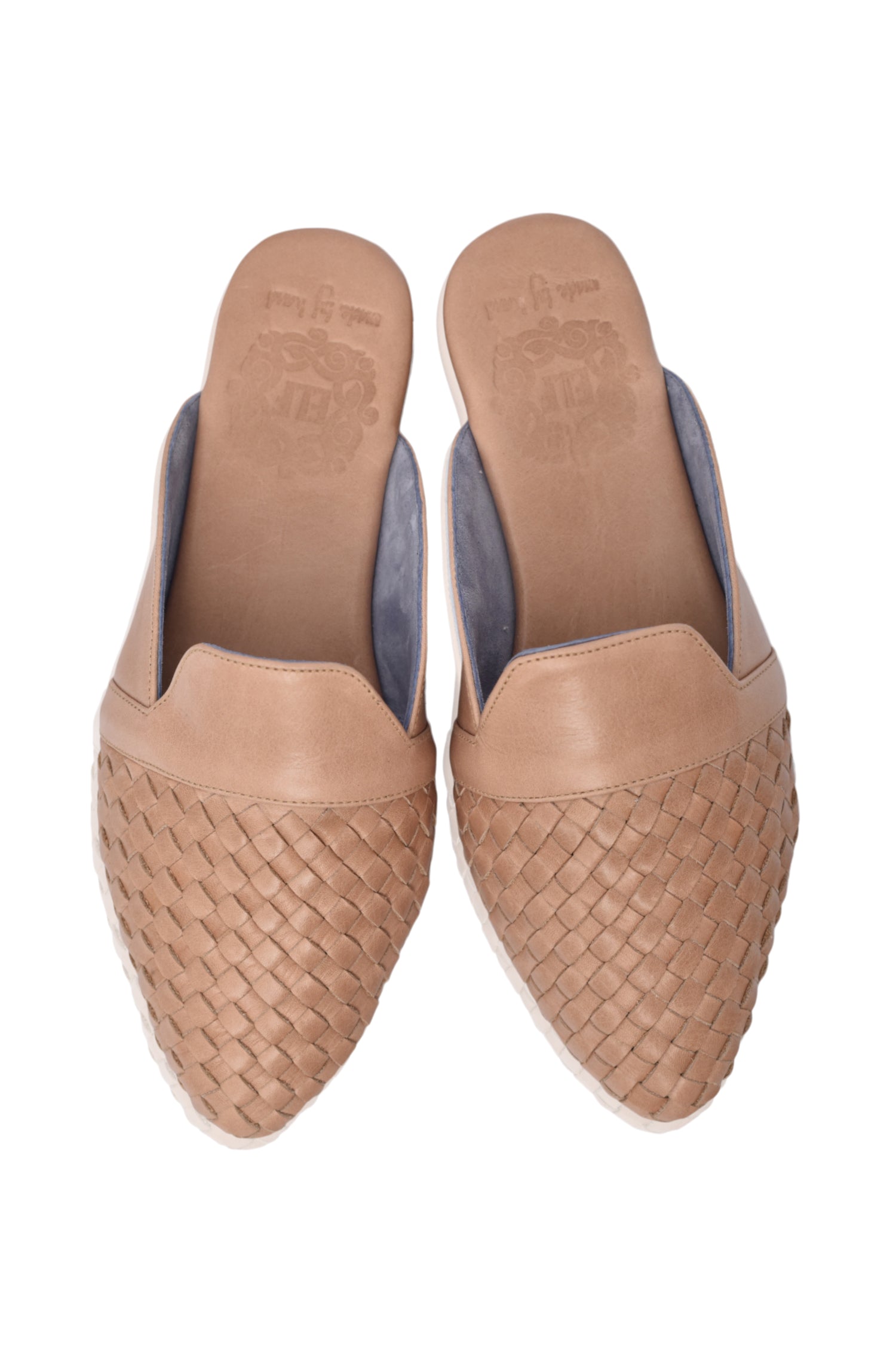 Como Leather Slides featuring a pointy toe design with a woven upper, crafted from genuine leather for a chic and sophisticated look.