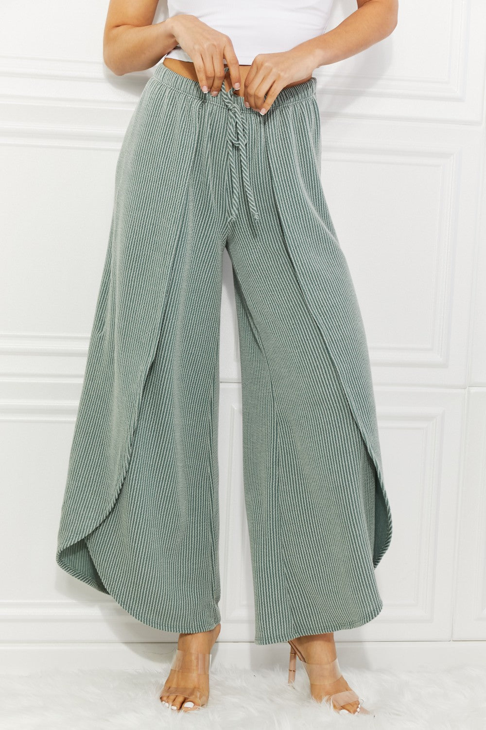 Confidently Chic Full Size Split Wide Leg Pants in Sage, featuring a stylish split-leg design and high waist for a chic summer look.