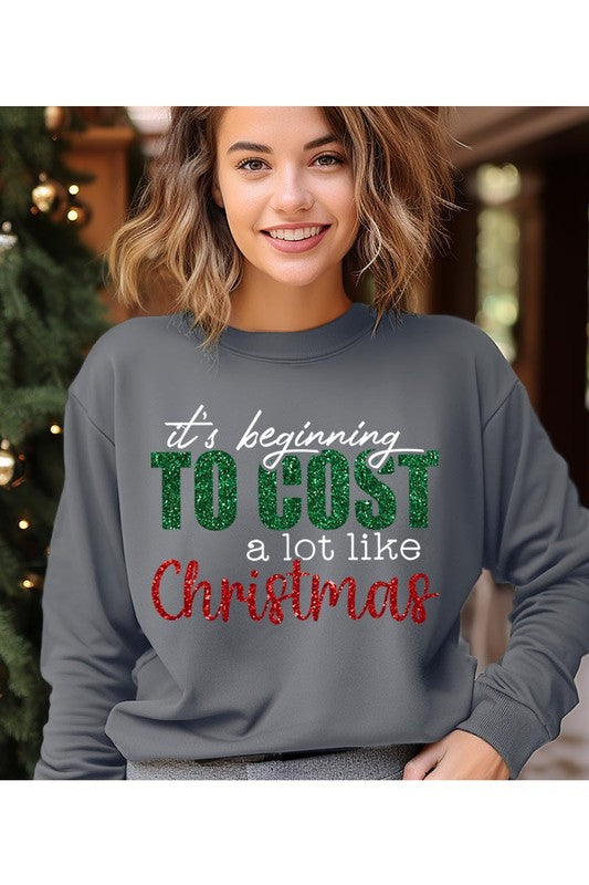 Cost Like Christmas Fleece Sweatshirt featuring a festive graphic, oversized fit, and long sleeves, perfect for holiday wear.