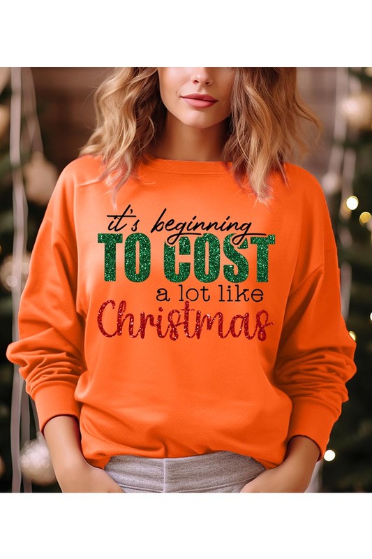 Cost Like Christmas Fleece Sweatshirt featuring a festive graphic, oversized fit, and long sleeves, perfect for holiday wear.
