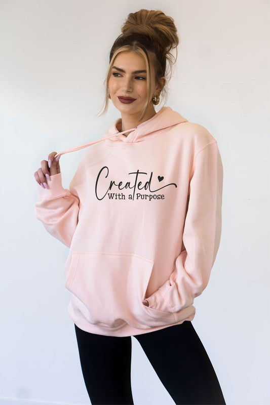 A cozy Created with Purpose Softest Ever Hoodie featuring a full front logo, made from a soft cotton-polyester blend.