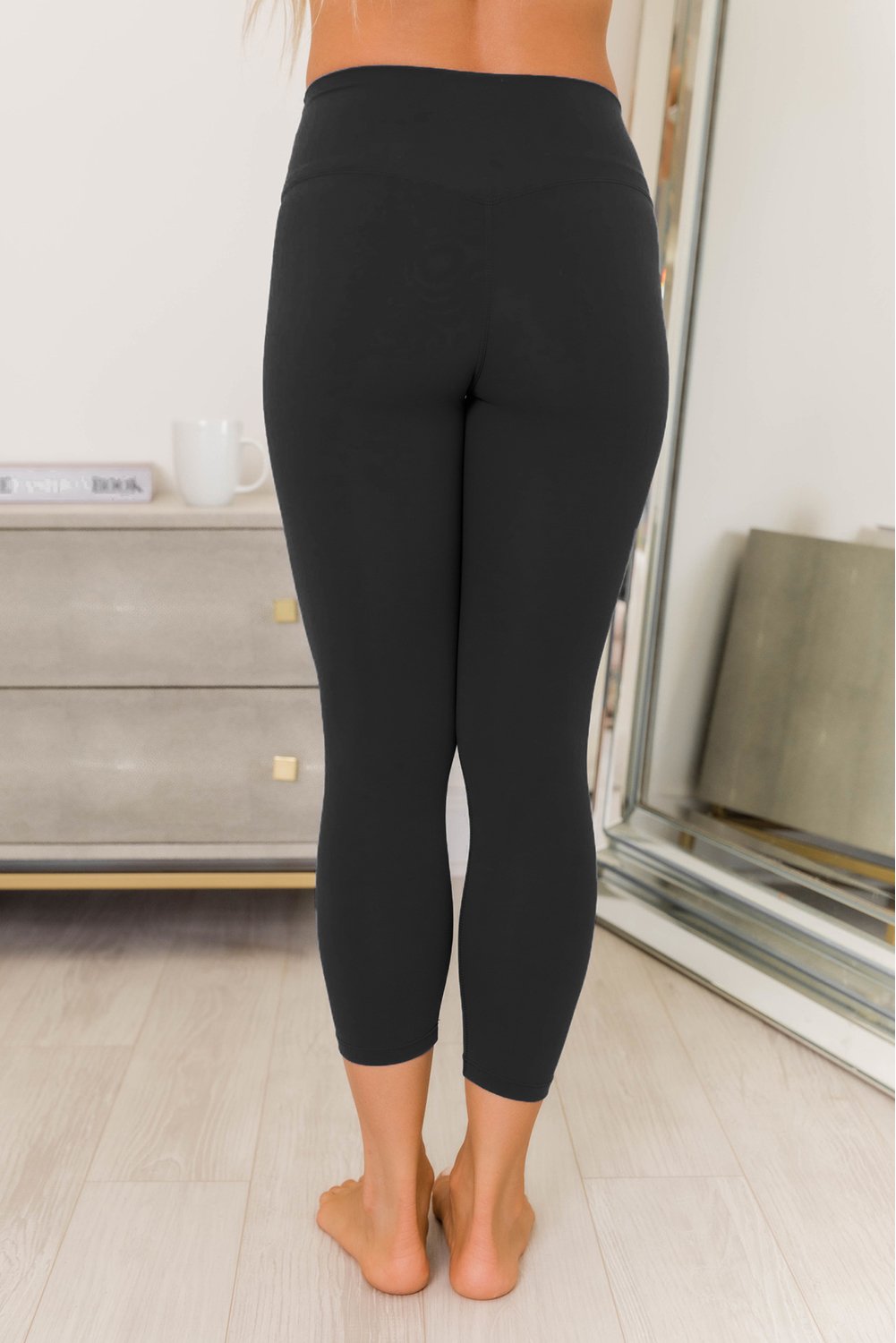 Crisscross Back Sports Bra Leggings Set in vibrant color, showcasing the stylish design and comfortable fit.