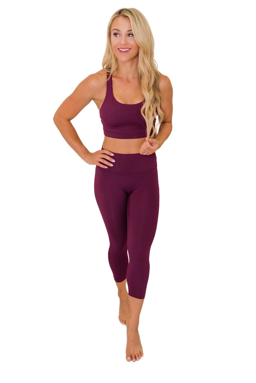 Crisscross Back Sports Bra Leggings Set in vibrant color, showcasing the stylish design and comfortable fit.