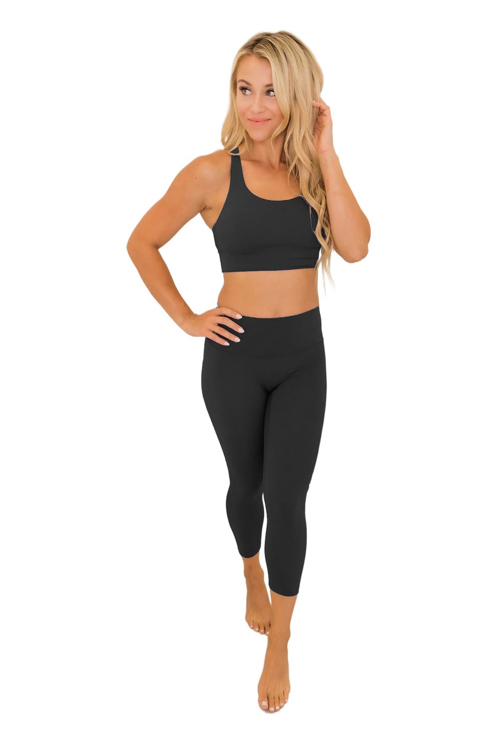 Crisscross Back Sports Bra Leggings Set in vibrant color, showcasing the stylish design and comfortable fit.