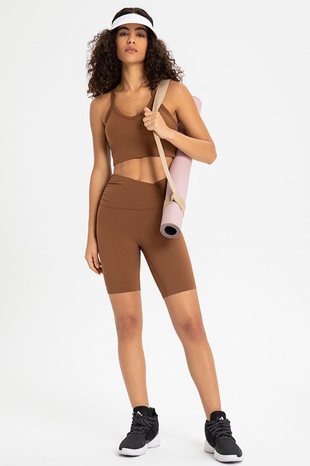 Crisscross Back V-Neck Sports Bra in solid color, featuring a stylish design and removable padding.