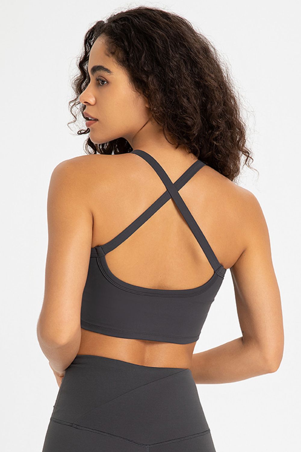Crisscross Back V-Neck Sports Bra in solid color, featuring a stylish design and removable padding.
