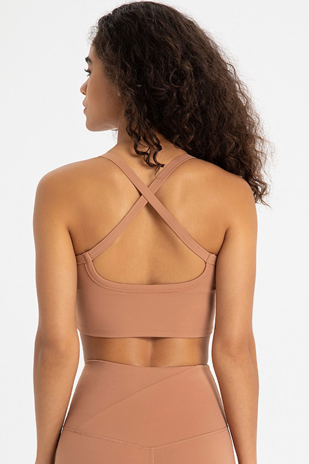 Crisscross Back V-Neck Sports Bra in solid color, featuring a stylish design and removable padding.
