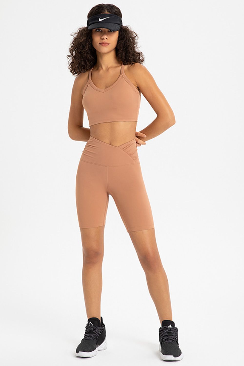 Crisscross Back V-Neck Sports Bra in solid color, featuring a stylish design and removable padding.