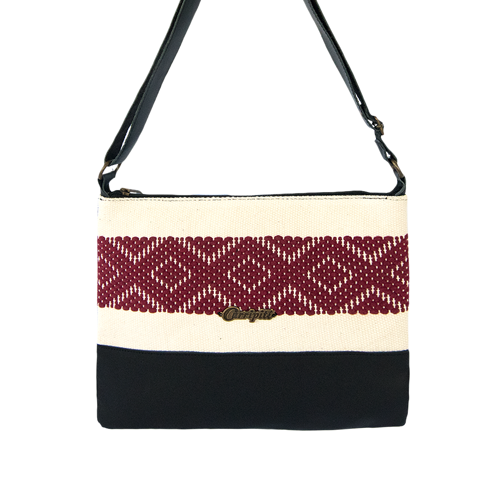 Elegant black leather cross-body bag featuring a burgundy stripe and geometric woven design, perfect for everyday use.