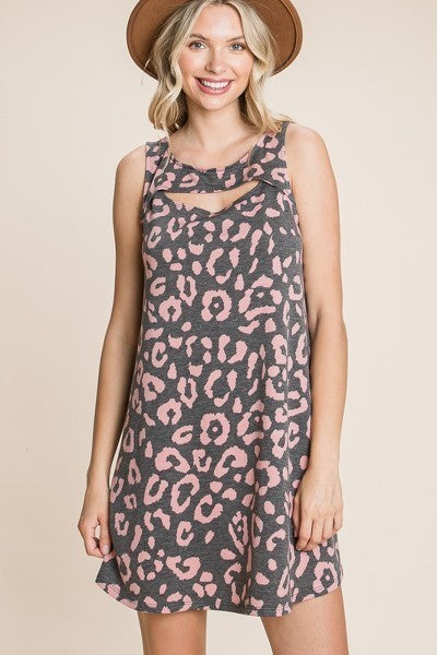 Cute animal print sleeveless tunic dress with cut-out neckline, perfect for summer wear.