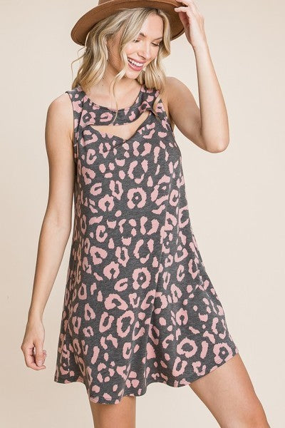 Cute animal print sleeveless tunic dress with cut-out neckline, perfect for summer wear.