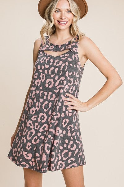Cute animal print sleeveless tunic dress with cut-out neckline, perfect for summer wear.