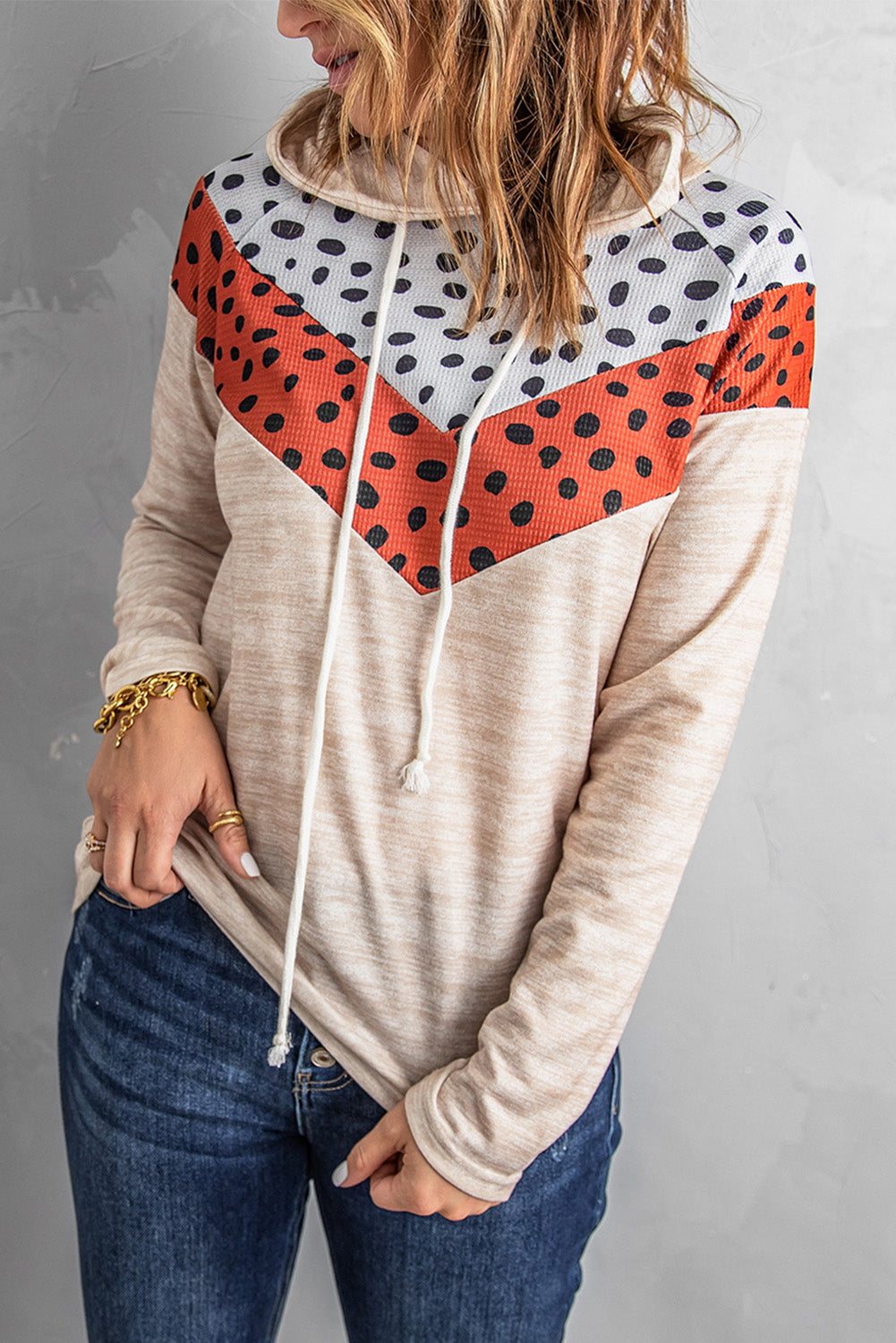Dotted Color Block Chevron Drawstring Detail Hoodie featuring a trendy color block pattern and adjustable drawstring hood.