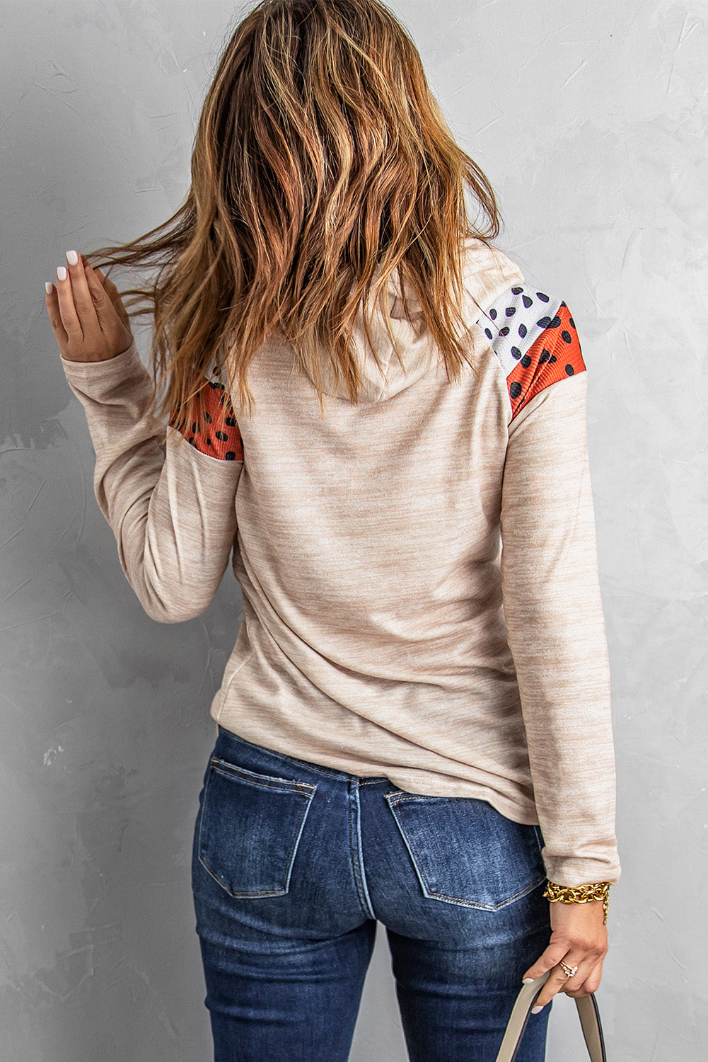 Dotted Color Block Chevron Drawstring Detail Hoodie featuring a trendy color block pattern and adjustable drawstring hood.