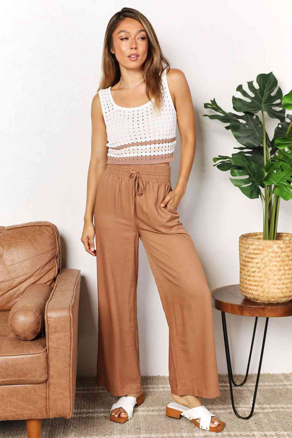 Double Take Drawstring Smocked Waist Wide Leg Pants in solid color, showcasing the drawstring waist and wide leg design.