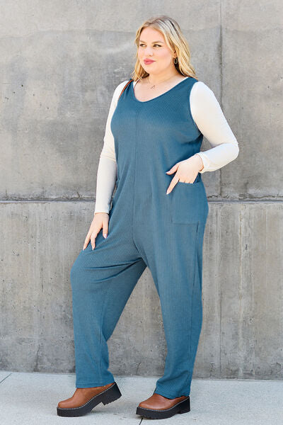 Double Take Full Size Sleeveless Straight Jumpsuit in black, featuring a straight cut, pockets, and a comfortable fit, perfect for various occasions.
