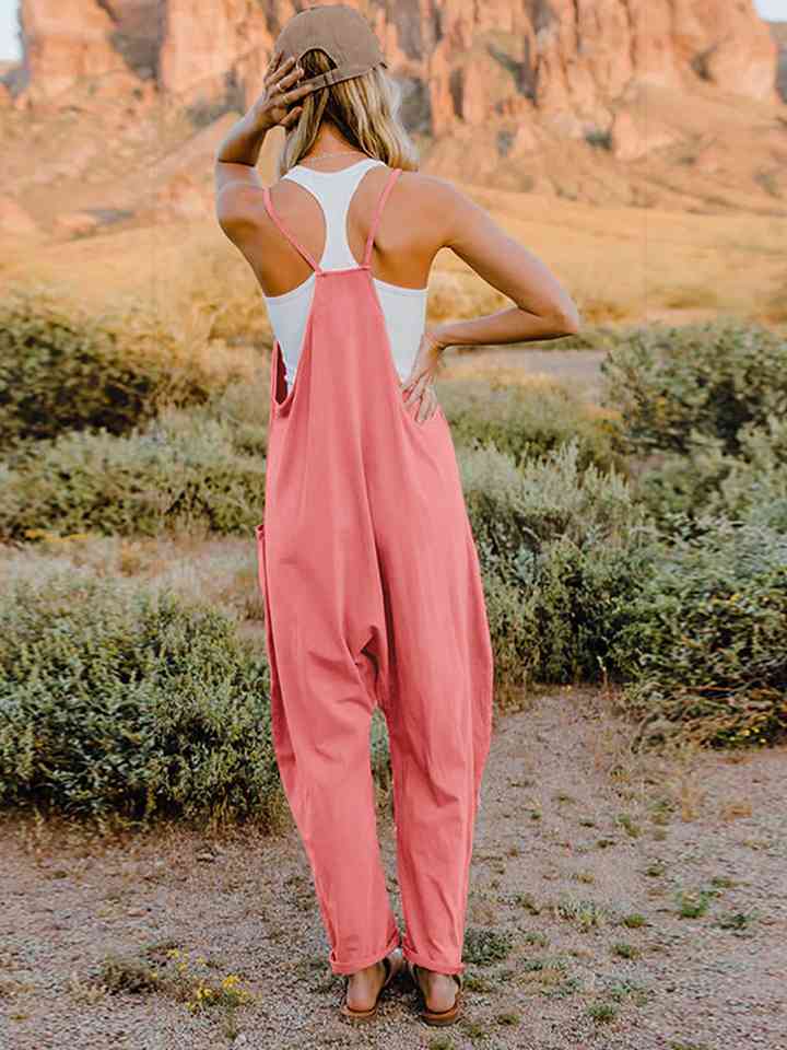 Double Take Full Size Sleeveless V-Neck Pocketed Jumpsuit in a stylish design, showcasing its V-neckline and side pockets.